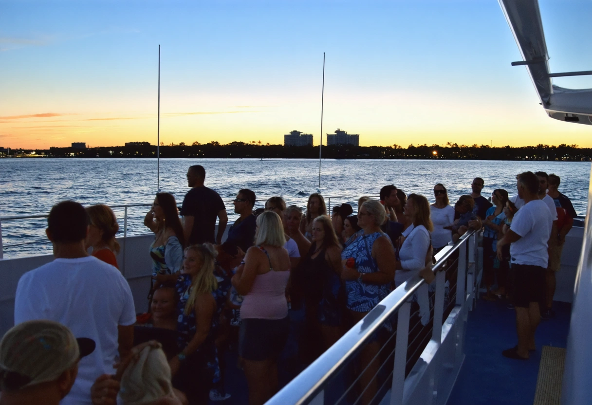 A Sarasota sunset cruise preparing to depart. Passengers board under a clear sky, eager for